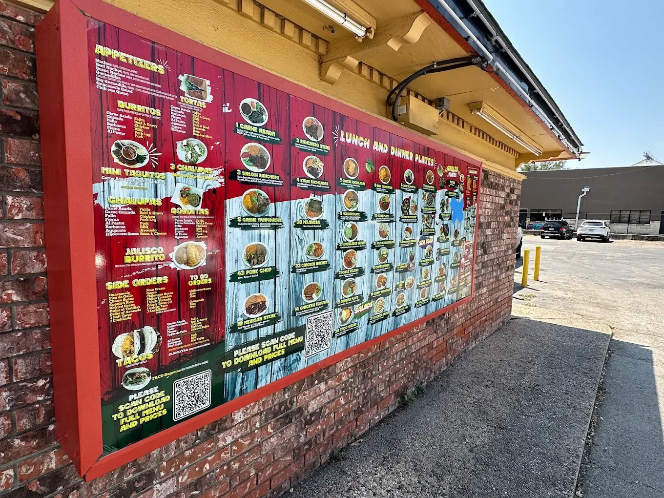 Outdoor drive-thru menu board at Taqueria El Tapatio